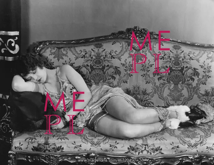 : Woman asleep on couch : Woman asleep on couch