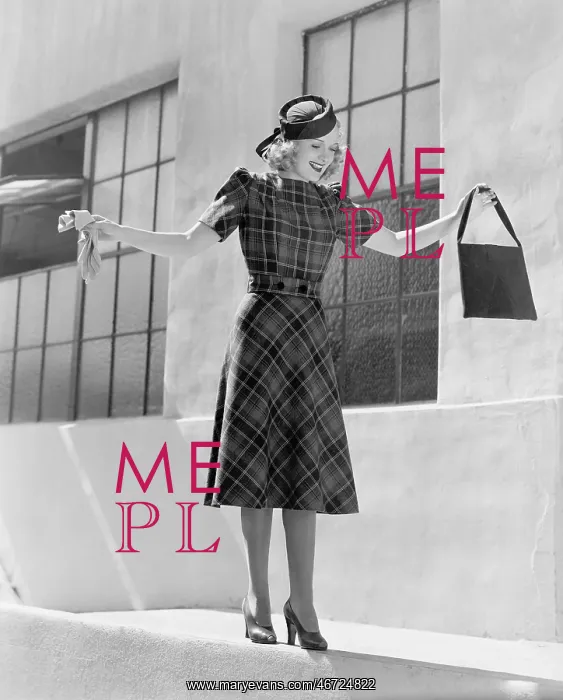  : Woman balancing on edge of wall