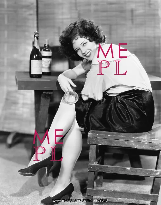  : Woman in a bar looking over her shoulder and laughing