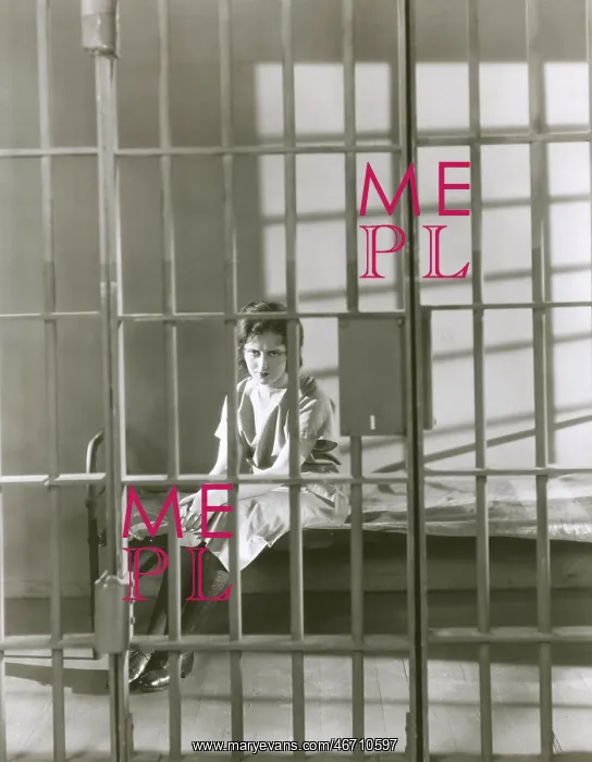  : Woman behind bars