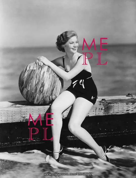  : Woman with a beach ball