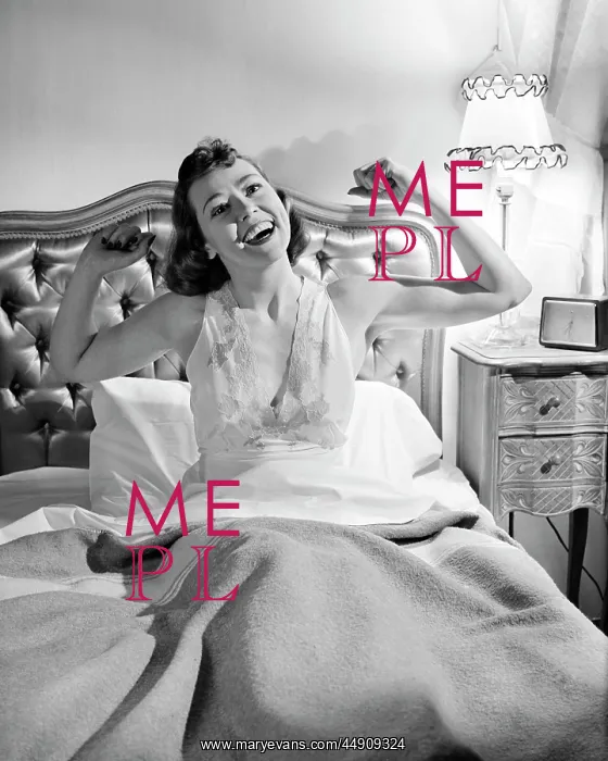  : Woman in Bed Stretching Arms