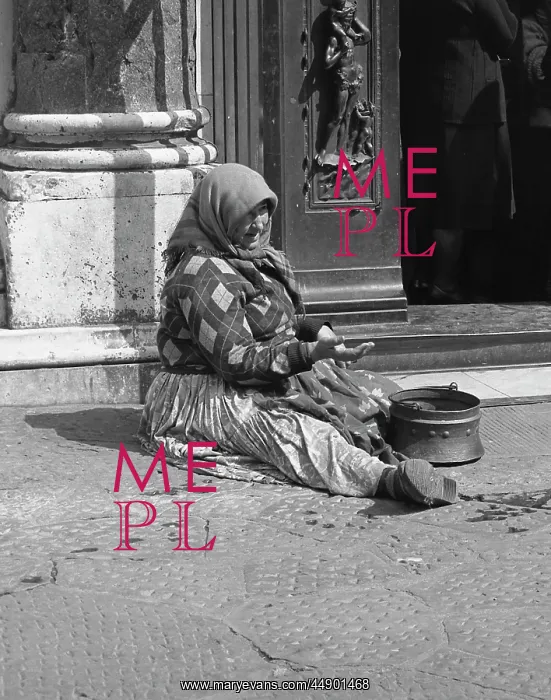 : Woman begging in front of a church : Woman begging in front of a church