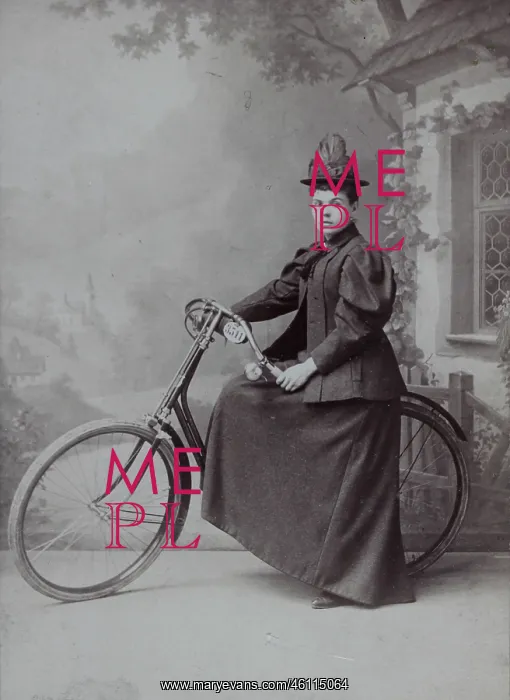 : Woman with bicycle in the studio : Woman with bicycle in the studio