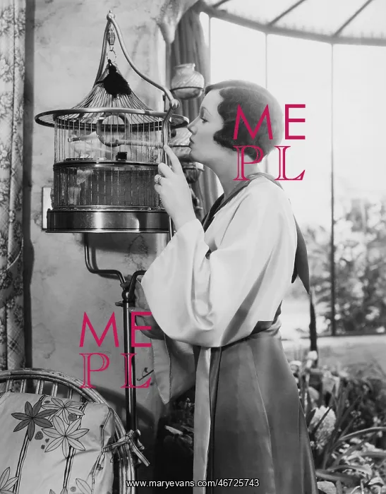 : Woman with bird in cage : Woman with bird in cage