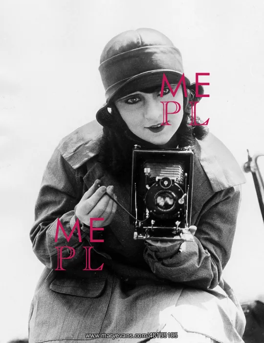 : Woman with camera : Woman with camera