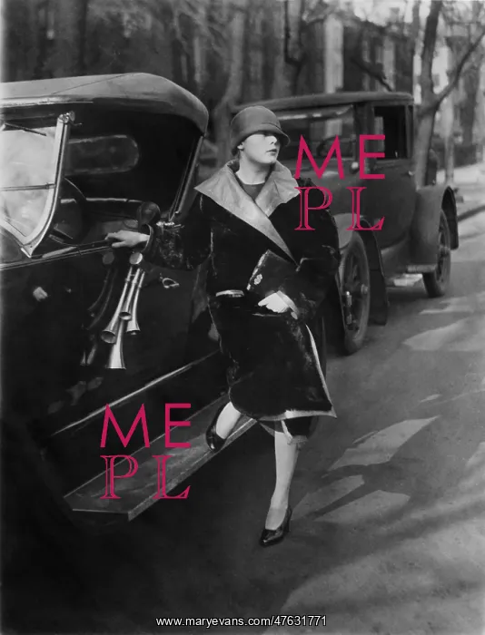  : Woman beside car