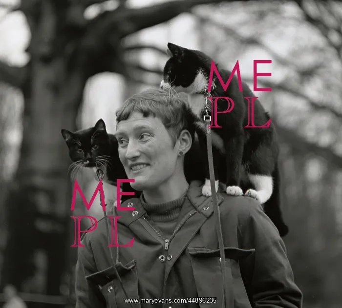 : Woman with a cat on either shoulder : Woman with a cat on either shoulder