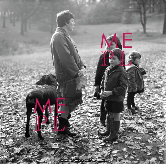 : Woman with three children and dog : Woman with three children and dog