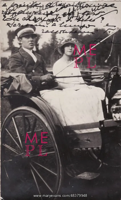  : Woman and coachman in an open carriage