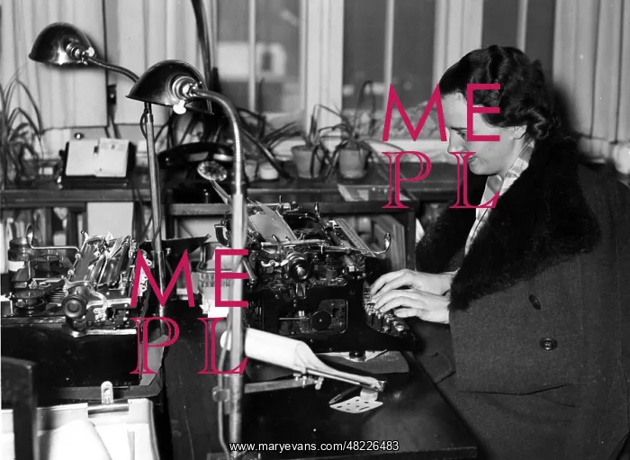 : Woman with coat in an office, 1940 : Woman with coat in an office, 1940