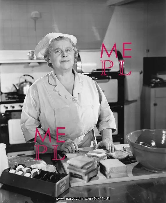 : Woman cook at the cafeteria kitchen : Woman cook at the cafeteria kitchen
