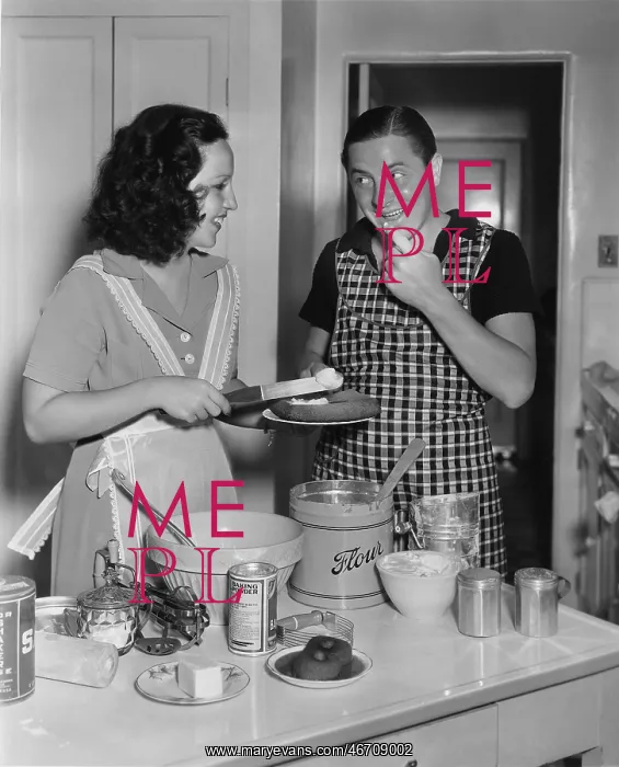 : Woman cooking dessert in the kitchen : Woman cooking dessert in the kitchen