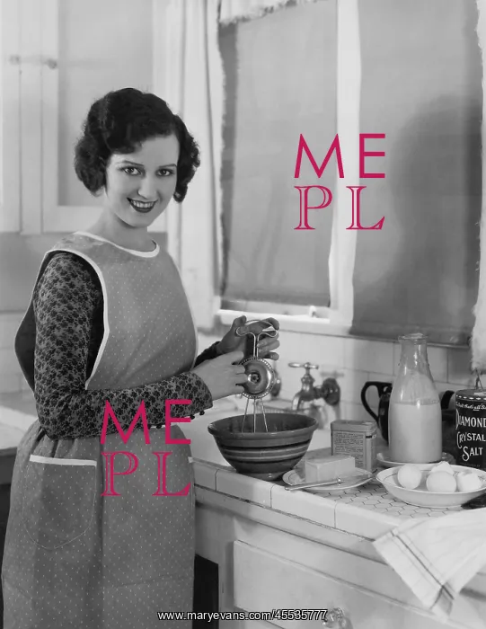: Woman cooking in kitchen : Woman cooking in kitchen