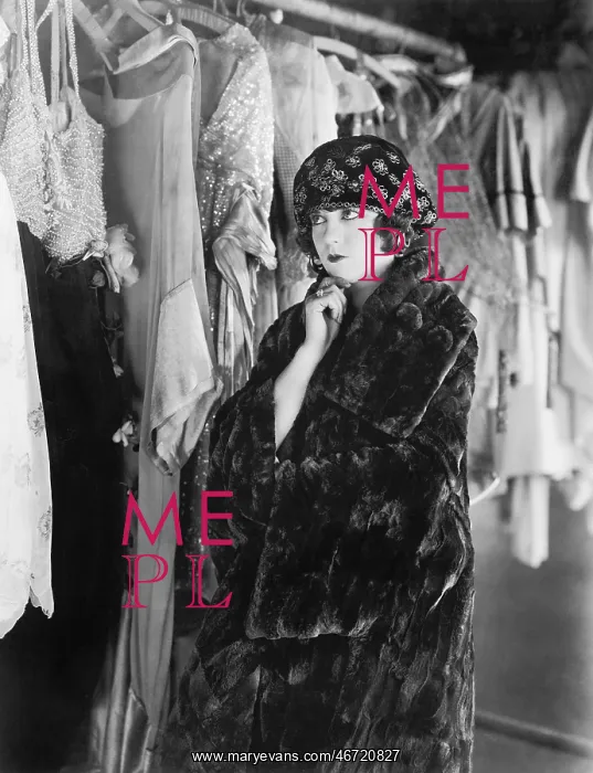 : Woman deciding what to wear : Woman deciding what to wear