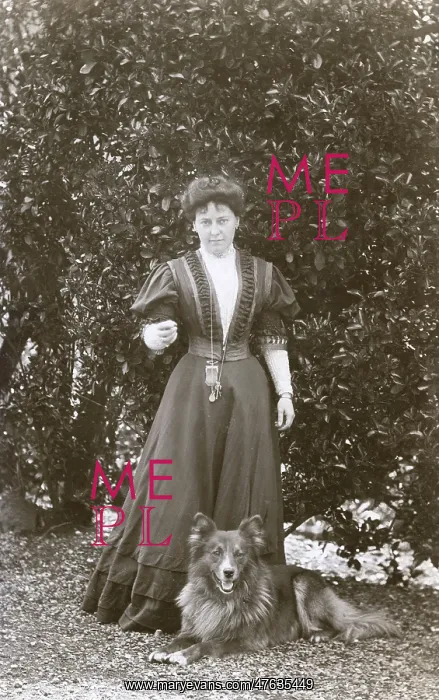  : Woman with a dog in a garden