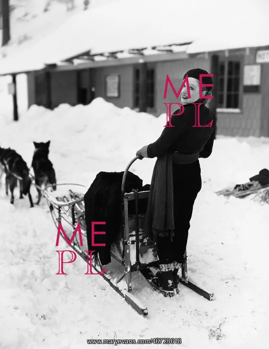 : Woman on dogsled : Woman on dogsled