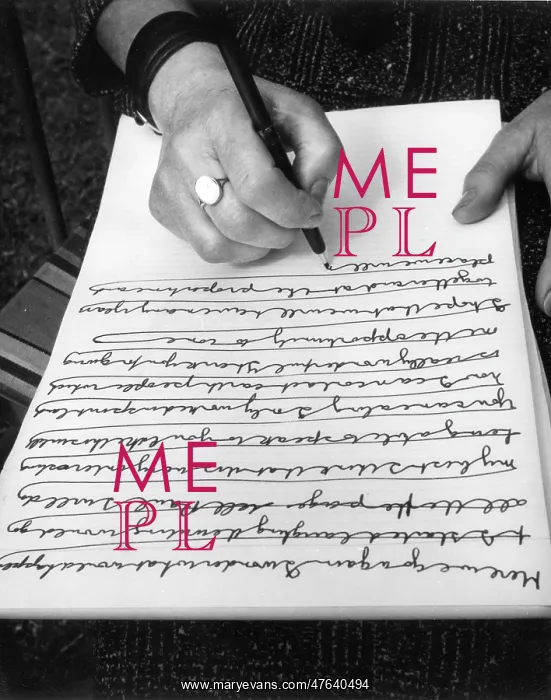 : Woman doing automatic writing in a garden : Woman doing automatic writing in a garden