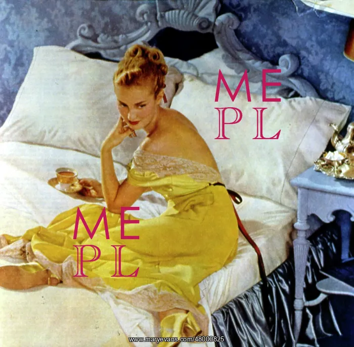 : Woman eating breakfast in bed : Woman eating breakfast in bed