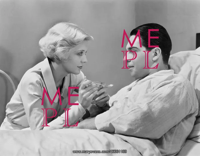  : Woman feeding patient