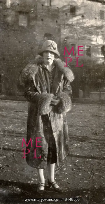  : A woman in a fur coat