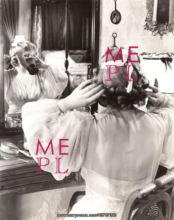 : Woman in gas mask looking in mirror : Woman in gas mask looking in mirror