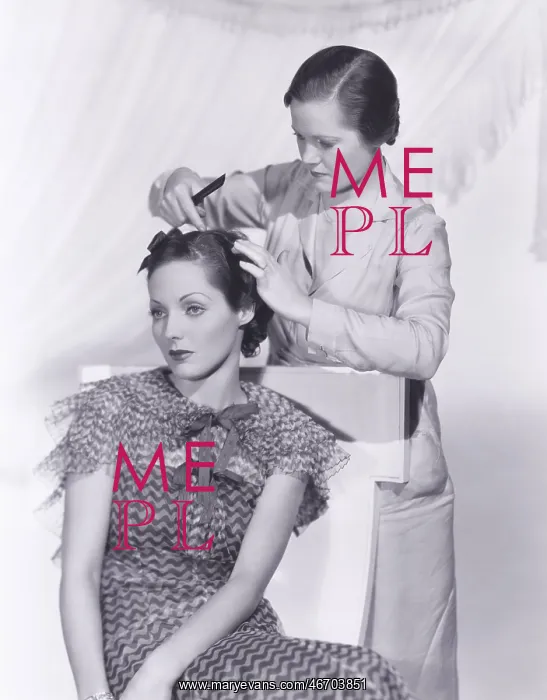 : Woman getting her hair done : Woman getting her hair done