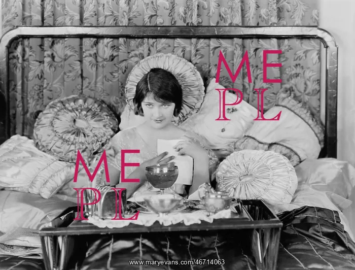 : Woman having breakfast in bed : Woman having breakfast in bed