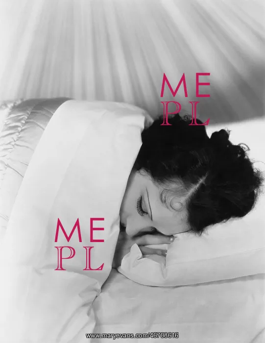  : Woman having a lie in in bed