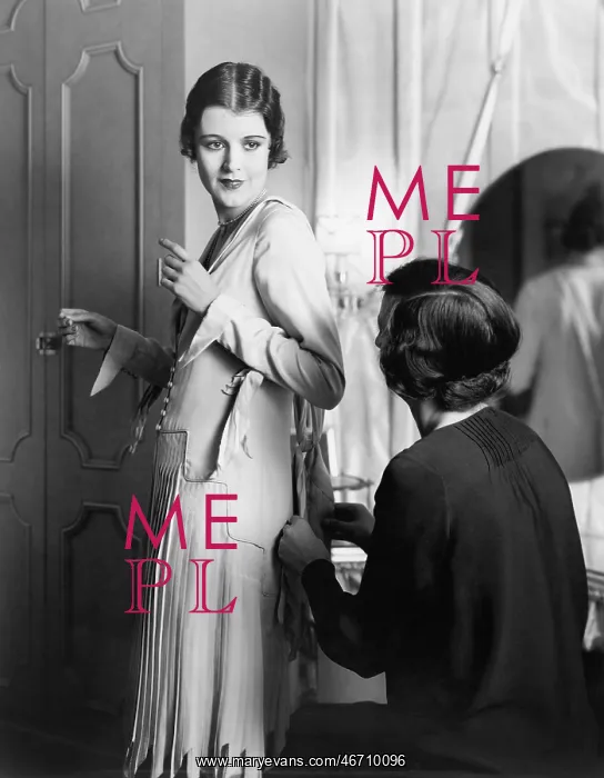 : One woman helping another woman getting dressed : One woman helping another woman getting dressed