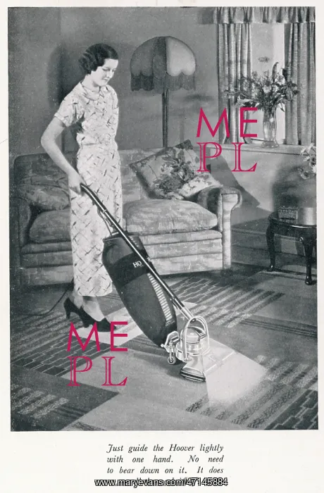 : Woman hoovering