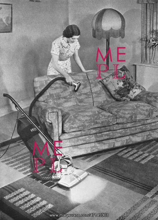  : Woman hoovering