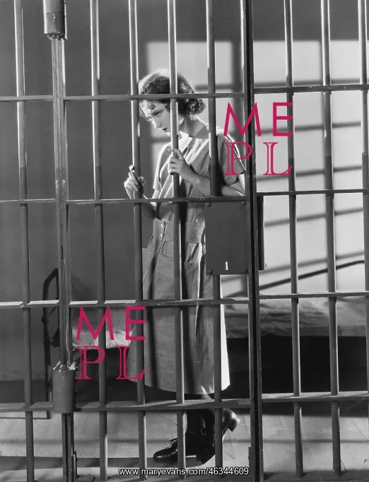 : Woman in jail cell : Woman in jail cell