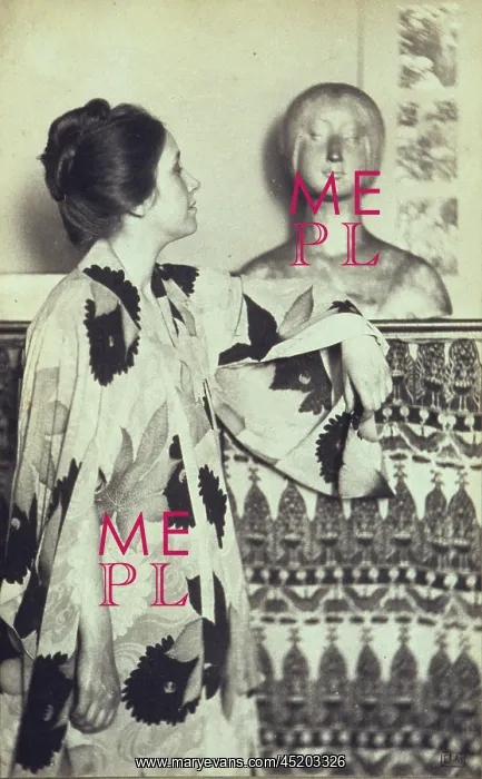 : Woman in a kimono standing looking at a ? : Woman in a kimono standing looking at a ?