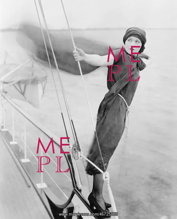 : Woman leaning off boat into the wind : Woman leaning off boat into the wind