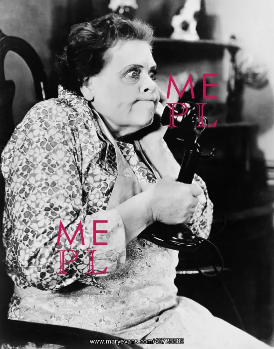 : Woman looking angry and talking on the phone : Woman looking angry and talking on the phone