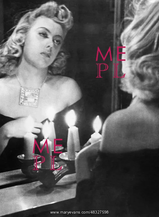 : Woman looking at herself in the mirror, 1941 : Woman looking at herself in the mirror, 1941