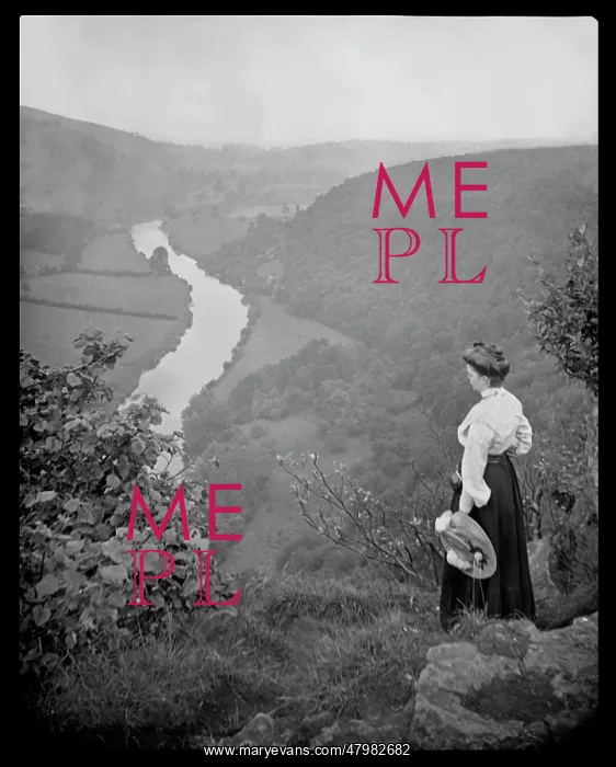 : Woman looking down into a valley : Woman looking down into a valley