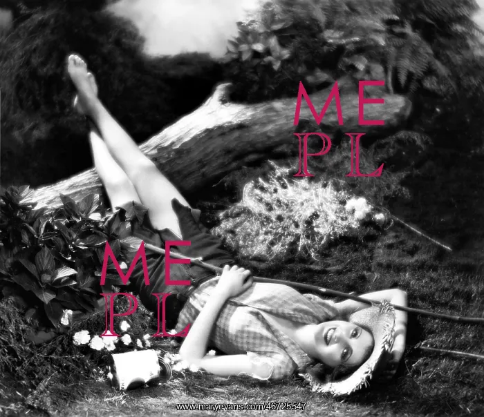 : Woman lying on the ground and smiling : Woman lying on the ground and smiling