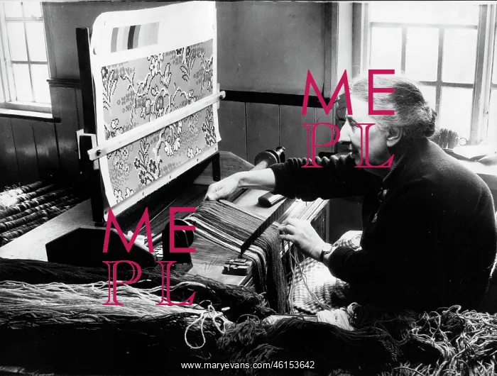 : Woman making handmade carpet : Woman making handmade carpet