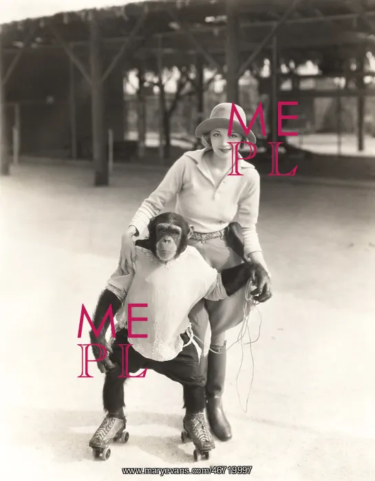 : Woman with monkey on roller skates : Woman with monkey on roller skates