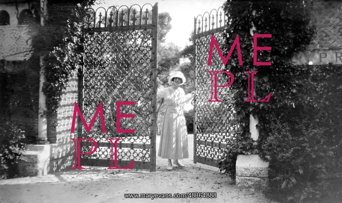  : Woman opening a gate