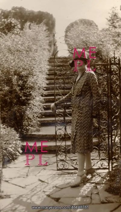  : A woman opens a gate