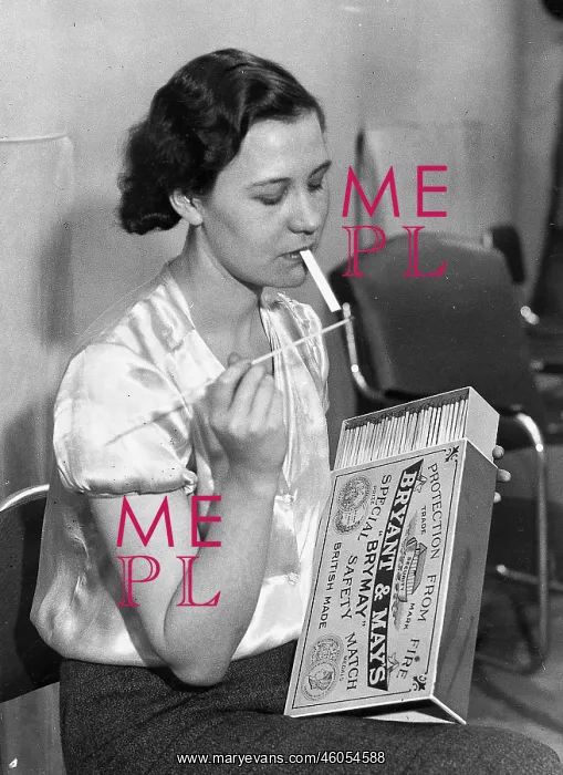 : Woman with oversized matches : Woman with oversized matches