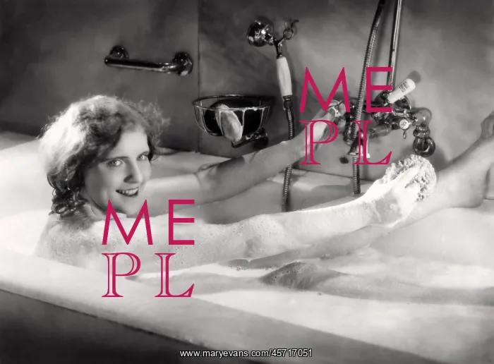 : Woman pampering herself with a bubble bath : Woman pampering herself with a bubble bath