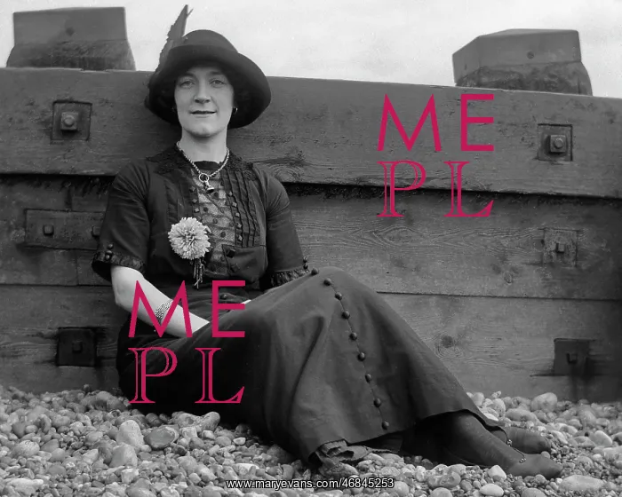 : Woman on a pebbly beach : Woman on a pebbly beach