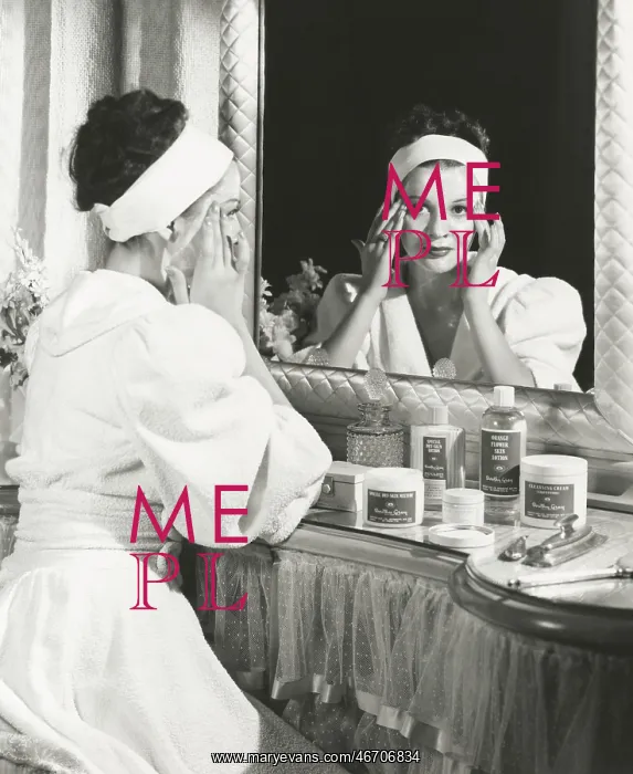: Woman peeling off face mask : Woman peeling off face mask