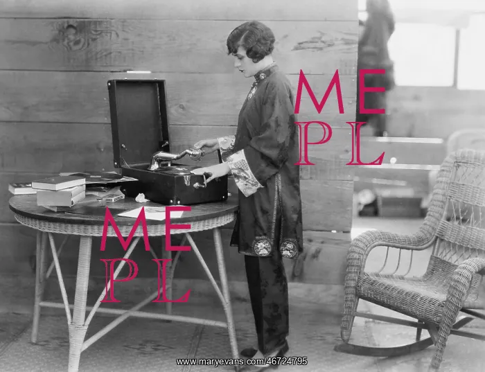 : Woman playing record : Woman playing record