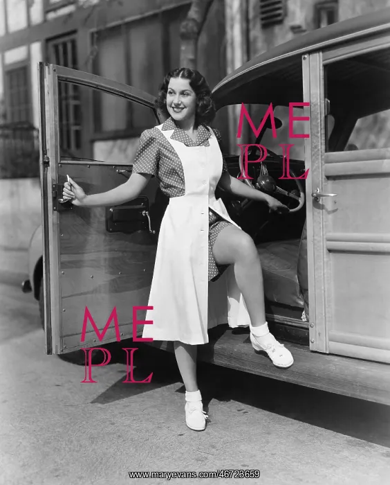 : Woman posing at door of car : Woman posing at door of car