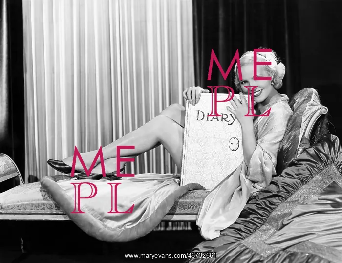  : Woman posing with large diary